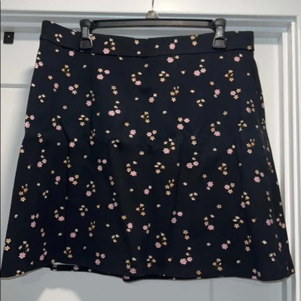 Loft circle mini skirt, black base with floral pattern, size large